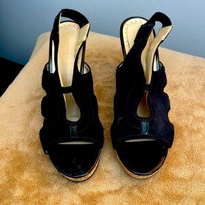 Black 4” platform sandals with cork heel. Gently worn 2-3 times